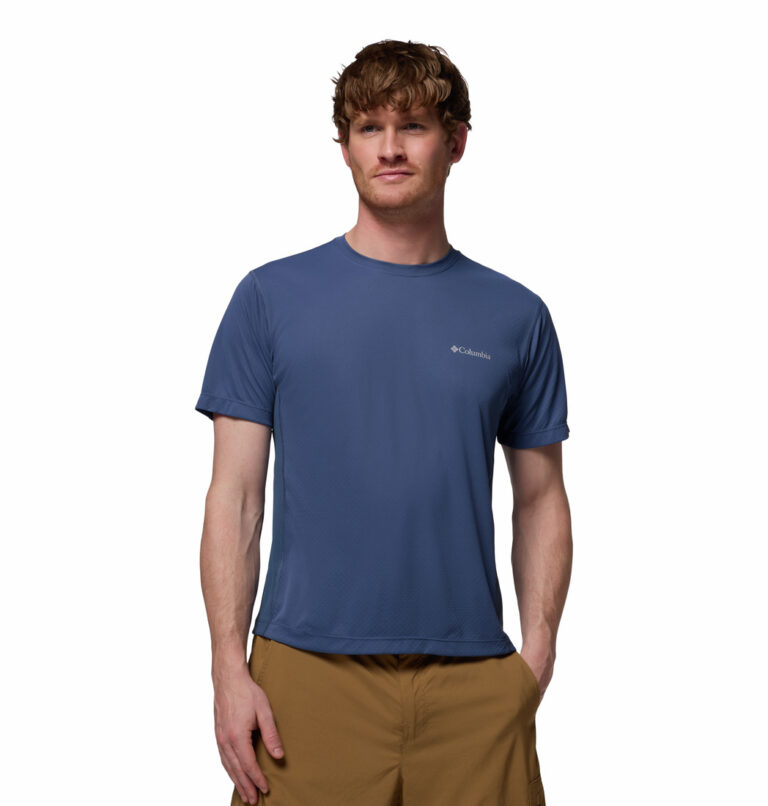 a man wearing a blue zero rules light short sleeve crew shirt