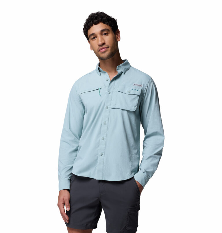 a man wearing a blue long sleeve shirt
