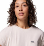 a women wearing a brown tee