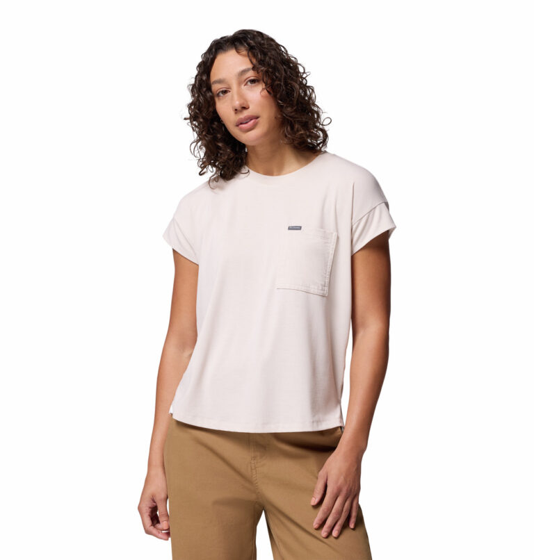 a women wearing a brown tee