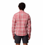 a man wearing a pink flannel long sleeve shirt