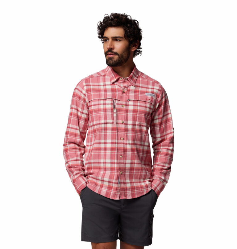 a man wearing a pink flannel long sleeve shirt