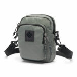 a grey shoulder bag