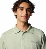 a man wearing a brown Utilizer Polo Shirt