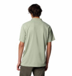 a man wearing a brown Utilizer Polo Shirt
