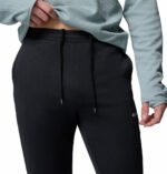 a man wearing a black fleece pants