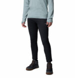a man wearing a black Essential Hike fleece pants