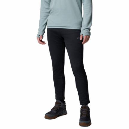 a man wearing a black Essential Hike fleece pants