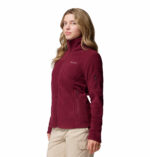a women wearing a red Fast Trek II Full Zip Fleece Jacket