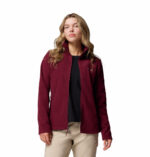 a women wearing a red Fast Trek II Full Zip Fleece Jacket