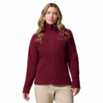 a women wearing a red Fast Trek II Full Zip Fleece Jacket