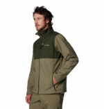 a man wearing a green brown Ascender Softshell Jacket
