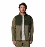 a man wearing a green brown Ascender Softshell Jacket