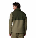a man wearing a green brown Ascender Softshell Jacket