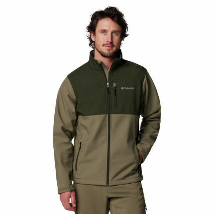 a man wearing a green brown Ascender Softshell Jacket