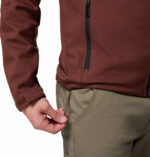 a man wearing a black brown ascender softshell jacket