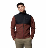 a man wearing a black brown ascender softshell jacket