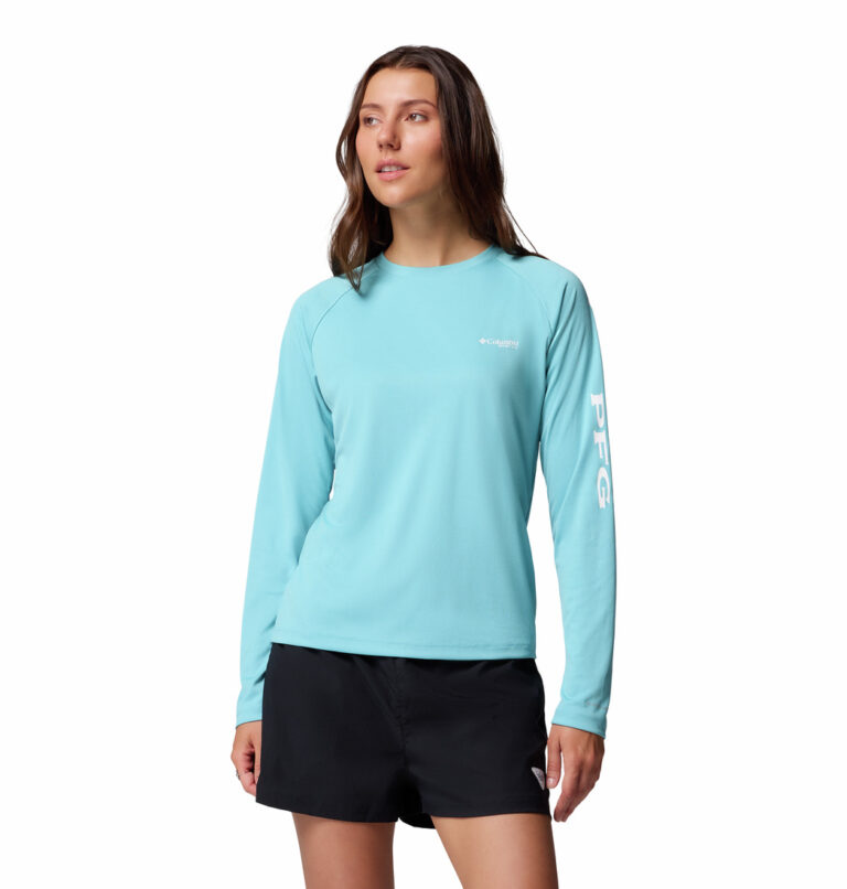 a women wearing a blue Tidal Tee Long Sleeve Shirt