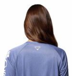 a women wearing a blue Tidal Tee Long Sleeve Shirt