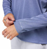 a women wearing a blue Tidal Tee Long Sleeve Shirt