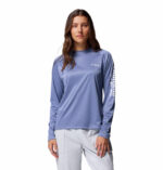 a women wearing a blue Tidal Tee Long Sleeve Shirt