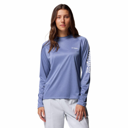 a women wearing a blue Tidal Tee Long Sleeve Shirt