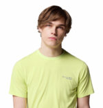 a man wearing a yellow endless trail running tech tee