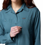 a women wearing a blue Silver Ridge Utility Long Sleeve Shirt