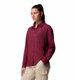 a women wearing a red silver ridge utility long sleeve shirt