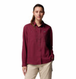 a women wearing a red silver ridge utility long sleeve shirt