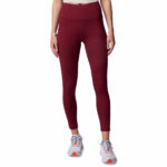 a women wearing a red boundless trek leggings