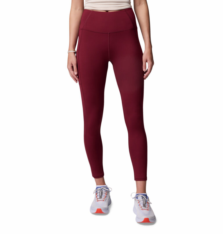 a women wearing a red boundless trek leggings