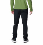 a man wearing black triple canyon II pants