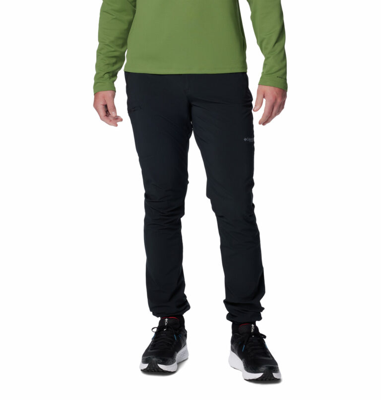 a man wearing black triple canyon II pants