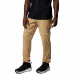 a man wearing brown triple canyon II convertible pants