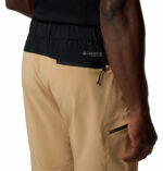 a man wearing brown triple canyon II convertible pants