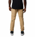 a man wearing brown triple canyon II convertible pants