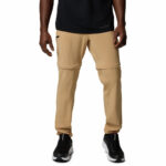 a man wearing brown triple canyon II convertible pants
