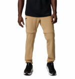 a man wearing brown triple canyon II convertible pants
