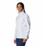 a women wearing a grey kruser ridge III softshell jacket