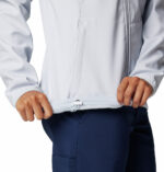 a women wearing a grey kruser ridge III softshell jacket