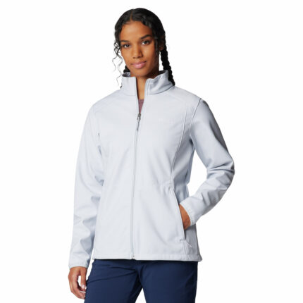a women wearing a grey kruser ridge III softshell jacket