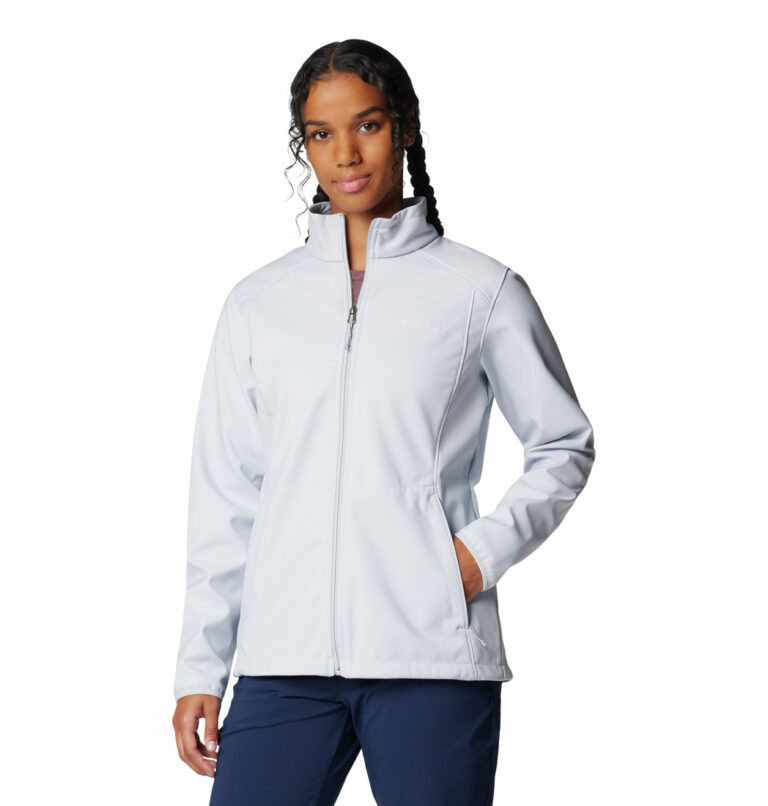 a women wearing a grey kruser ridge III softshell jacket