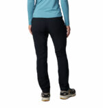 a women wearing a black high rise pants