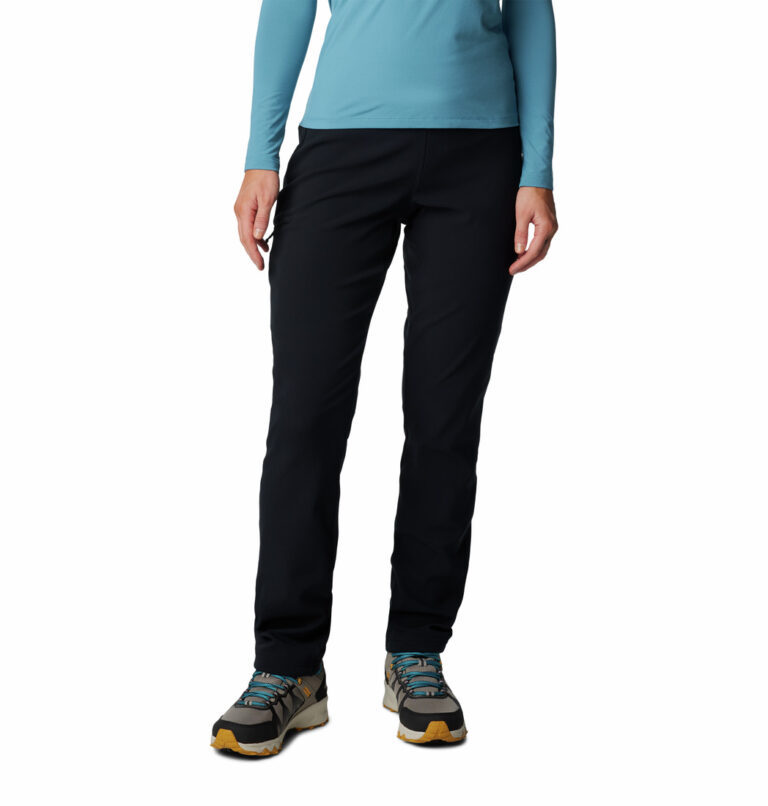 a women wearing a black high rise pants