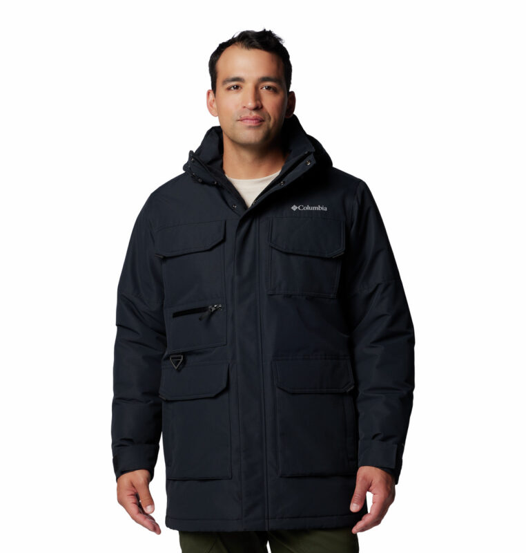 a man wearing a black landroamer II parka