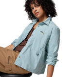 a women wearing a blue brea falls woven long sleeve shirt