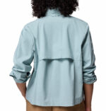 a women wearing a blue brea falls woven long sleeve shirt