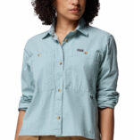 a women wearing a blue brea falls woven long sleeve shirt