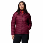 a women wearing a red corelite down hooded jacket
